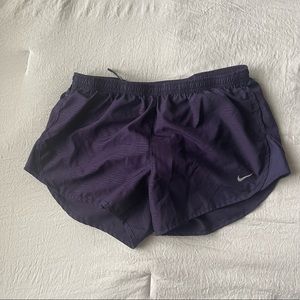 purple nike running shorts